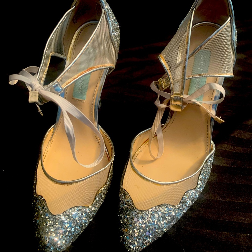Betsey Johnson Heels size 6 1/2.  A stain on side of the shoes worn once